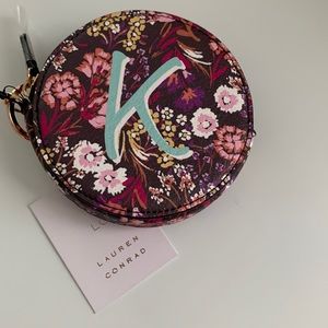 “K” initial round coin pure